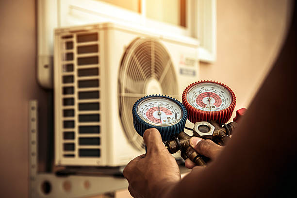 Professional Furnace Repair technician working in Camp Lake, WI